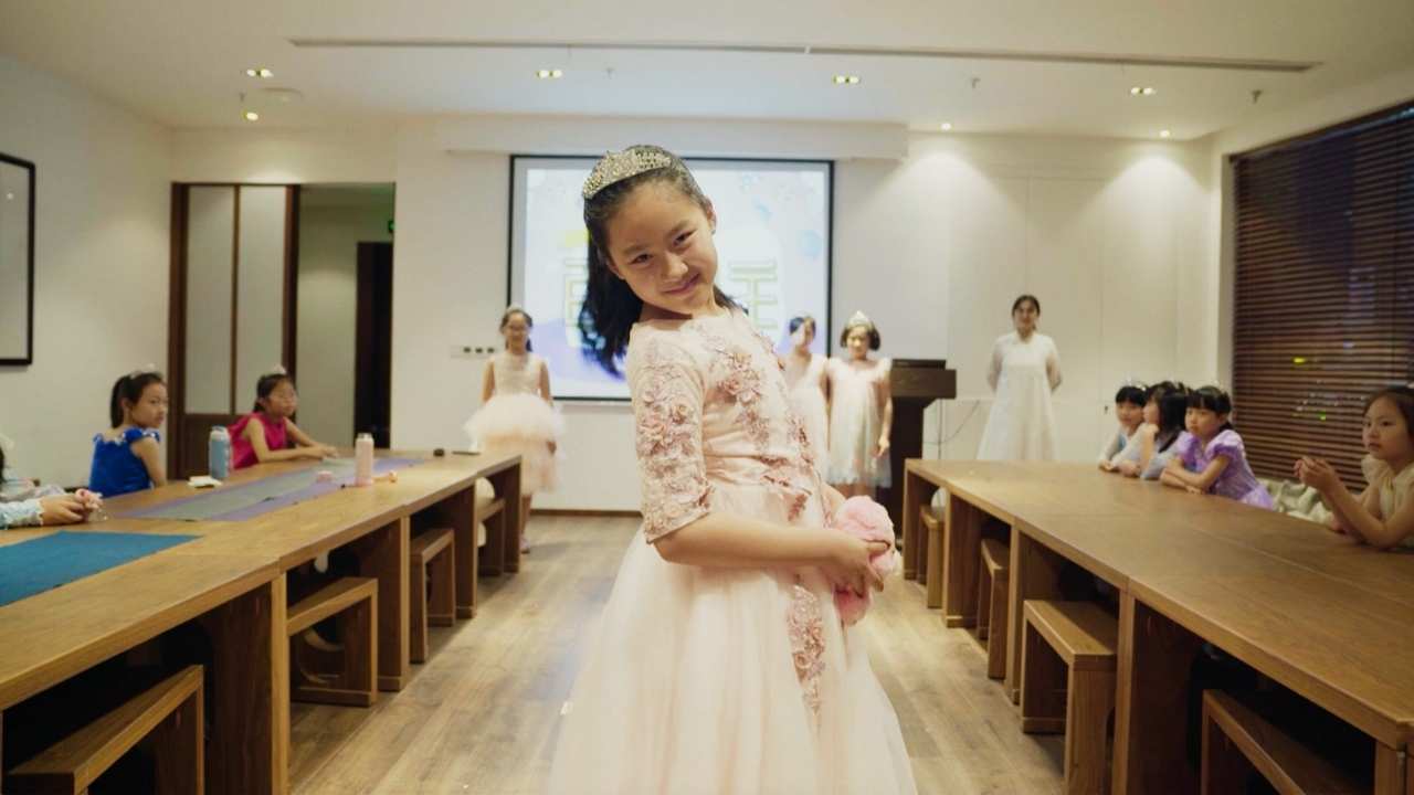a girl wearing a tiara
